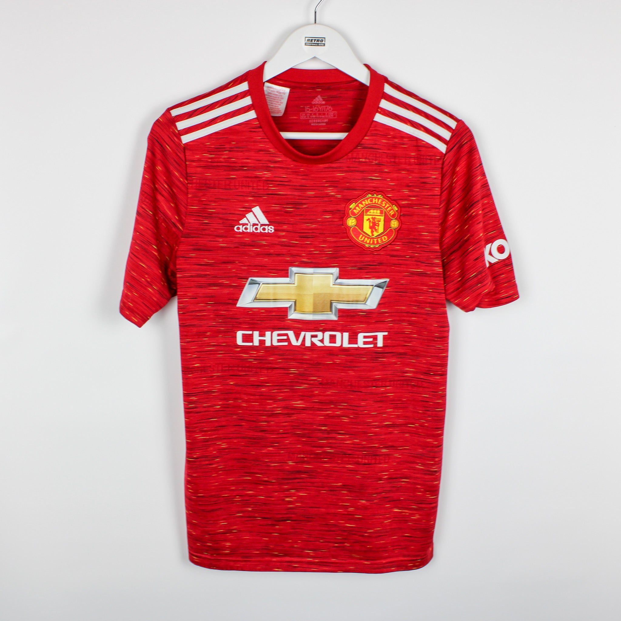 Manchester united boys shirt sales